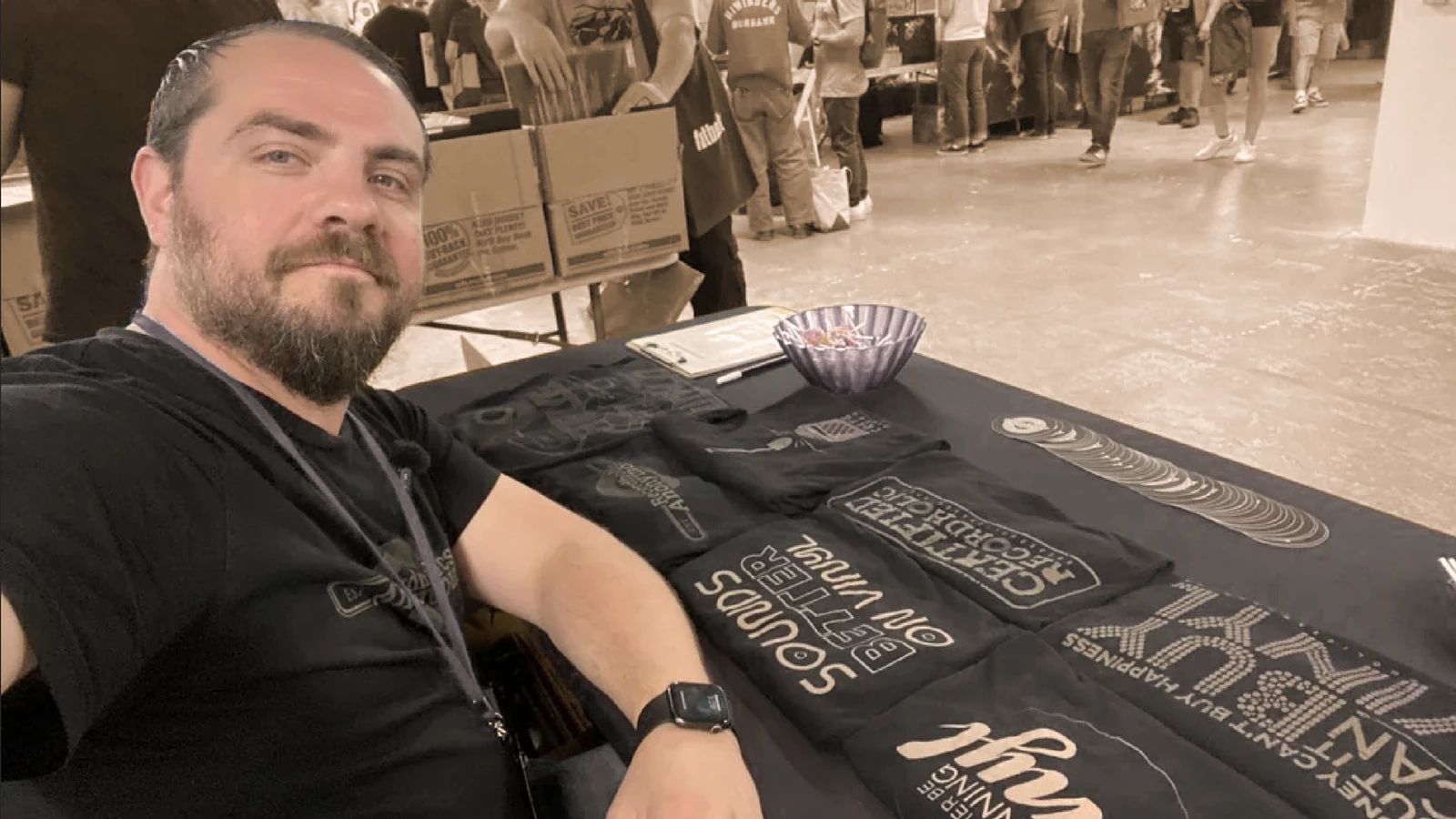 Gary at a record-show table with Recordholics merchandise